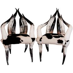 Pair of contemporary horn and hide chairs