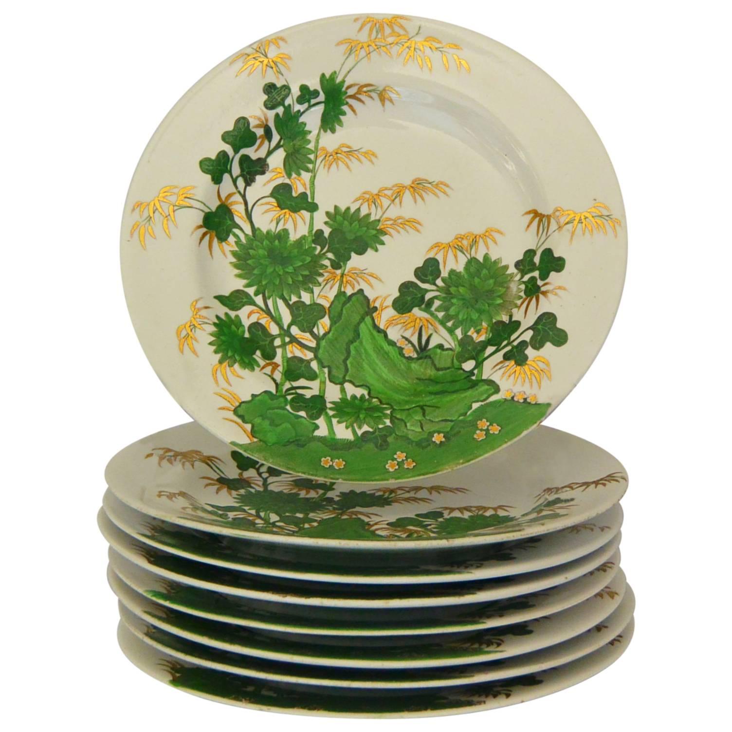 Set of Eight Gilt and Green Painted Spode Dessert Plates