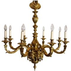 French 19th Century Eight Branch Gilt Metal Chandelier in the Louis XIV Style