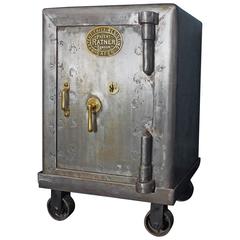 British Vintage Polished Safe by Ratner
s 1900s on Bespoke Trolley British Antique Polished Safe by Ratner
s 1900s on Bespoke Trolley