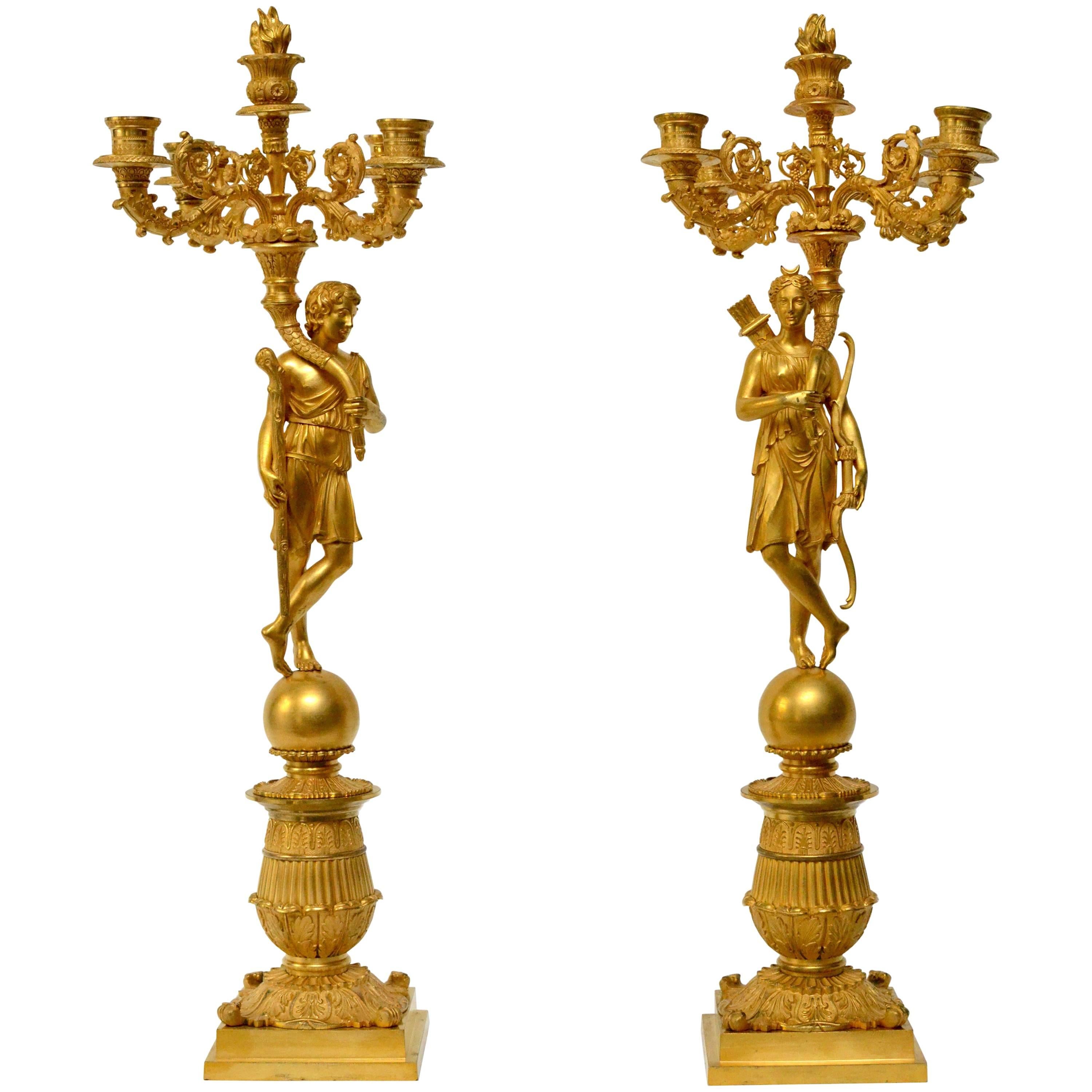 Pair of French Gilt Bronze and Patinated Empire Candelabra, circa 1825
