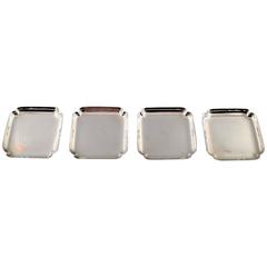 Four Pieces of Tiffany & Co., New York, Sterling Silver Coasters