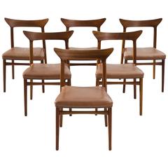 Set of Six Danish Dining Chairs in Walnut and Natural Leather