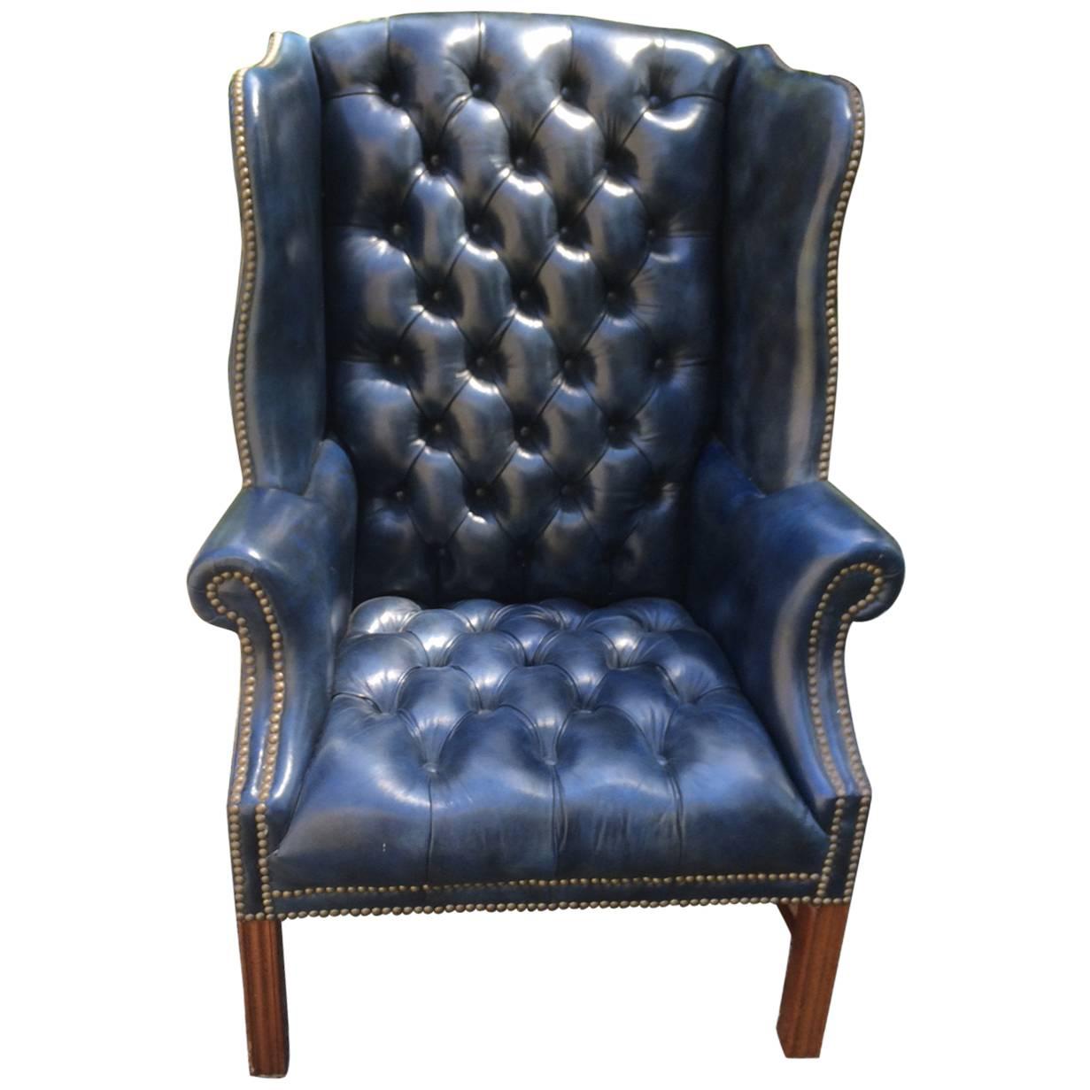 Fabulous Navy Blue Leather Tufted Wing Chair