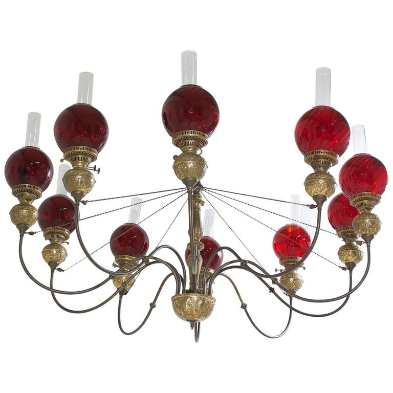 English Victorian Ten Light Chandelier In Brass With Cranberry Glass English Victorian Ten Light Chandelier In Brass With Cranberry Glass Globes For