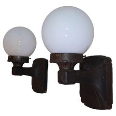 Pair of 1920' cast iron outdoor sconces