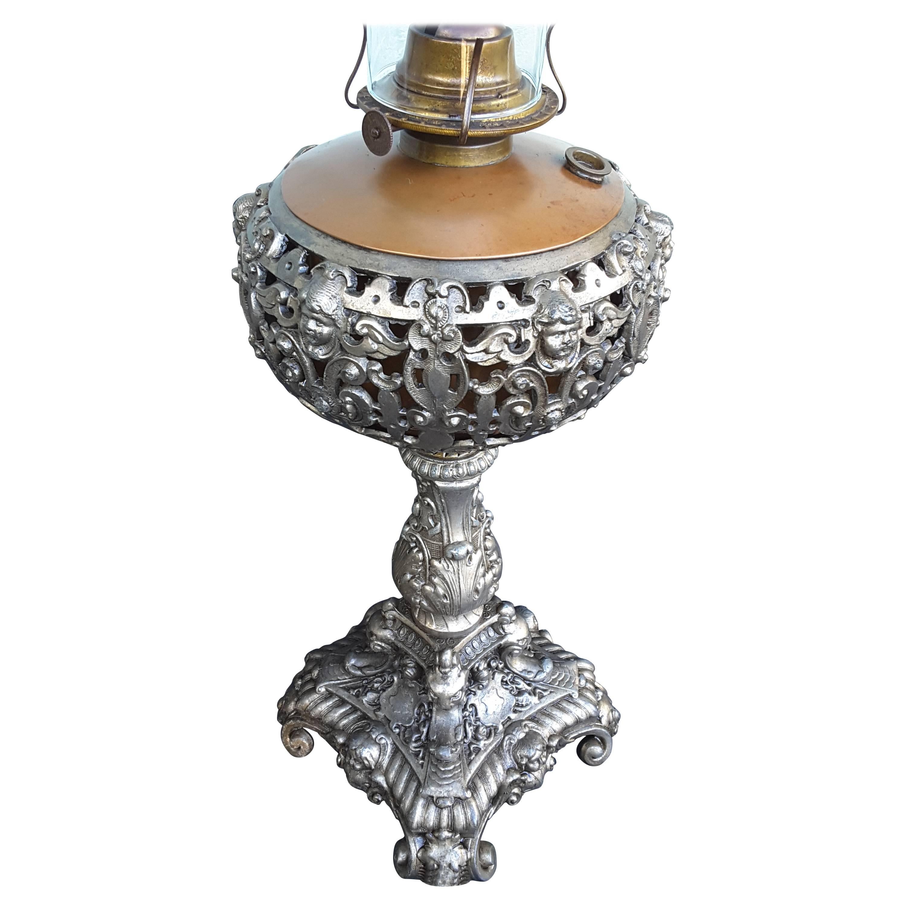 Angel Face Oil Lamp Silver Tone Finish Scrolled Foot & Acanthus Leaf Decoration