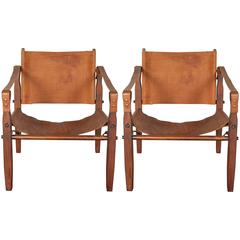 Pair of Gold Medal Co. Leather Sling Safari Chairs