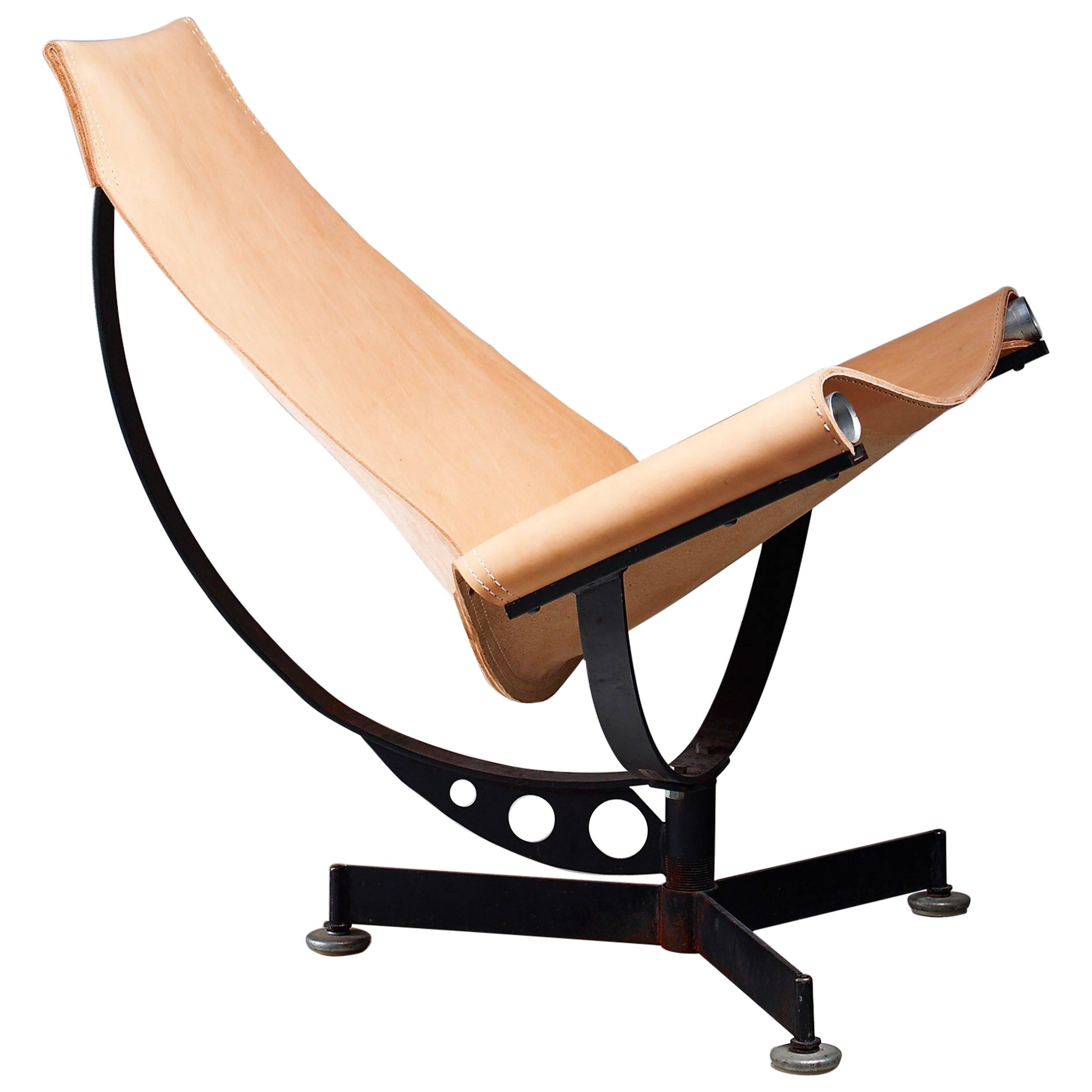 A leather sling lounge chair by Max Gottschalk. 
The chair has a black iron frame with a natural leather seating.
The chair has been professionally reupholstered in our in-house atelier.
