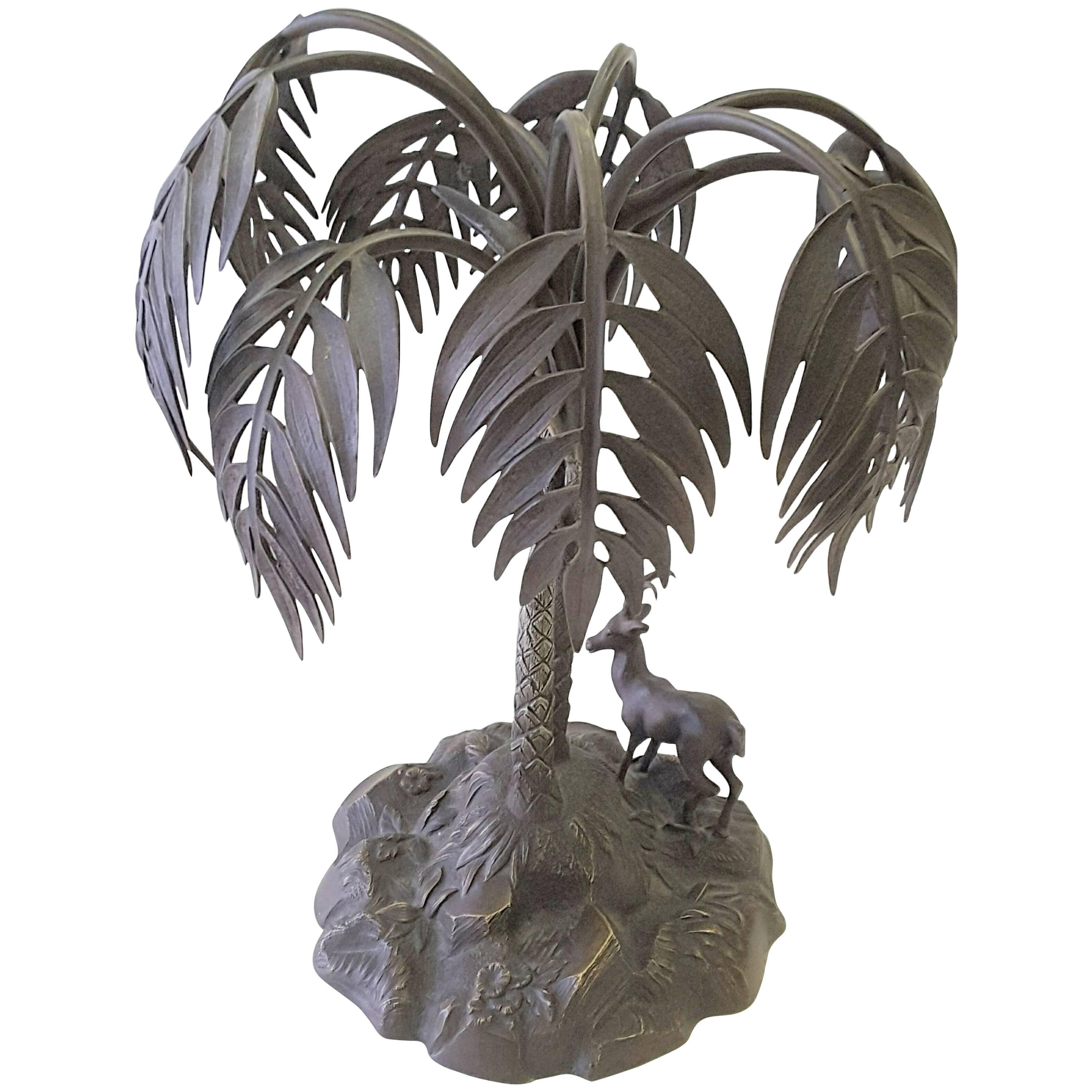 Bronzed Sculpture of a Palm Tree and Gazelle on a Rock Base