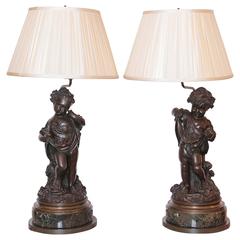 Pair of 19th Century French Patinated Bronze Figures of Cherubs Made into Lamps