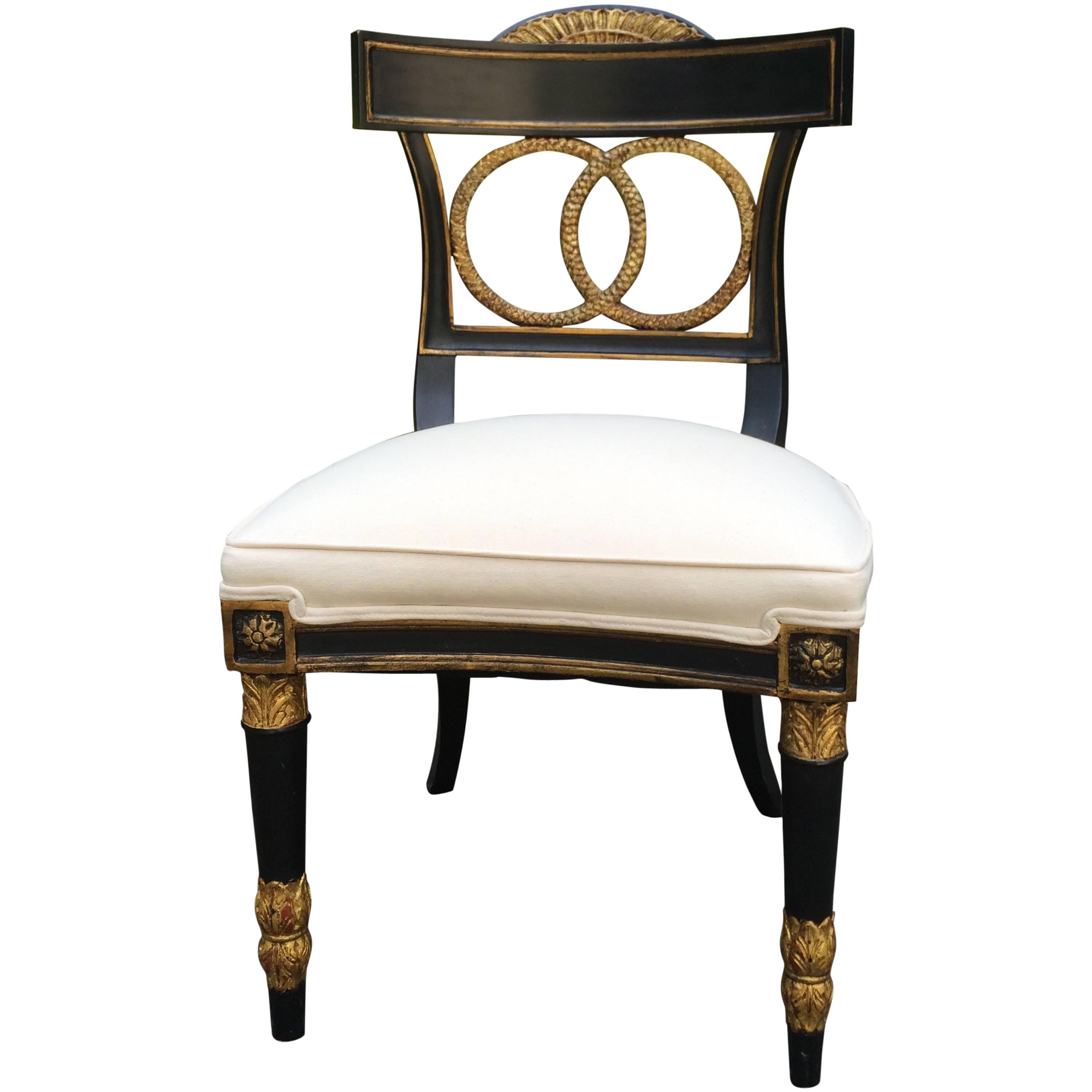 Elegant Ebonized and Gilt Hollywood Regency Chair