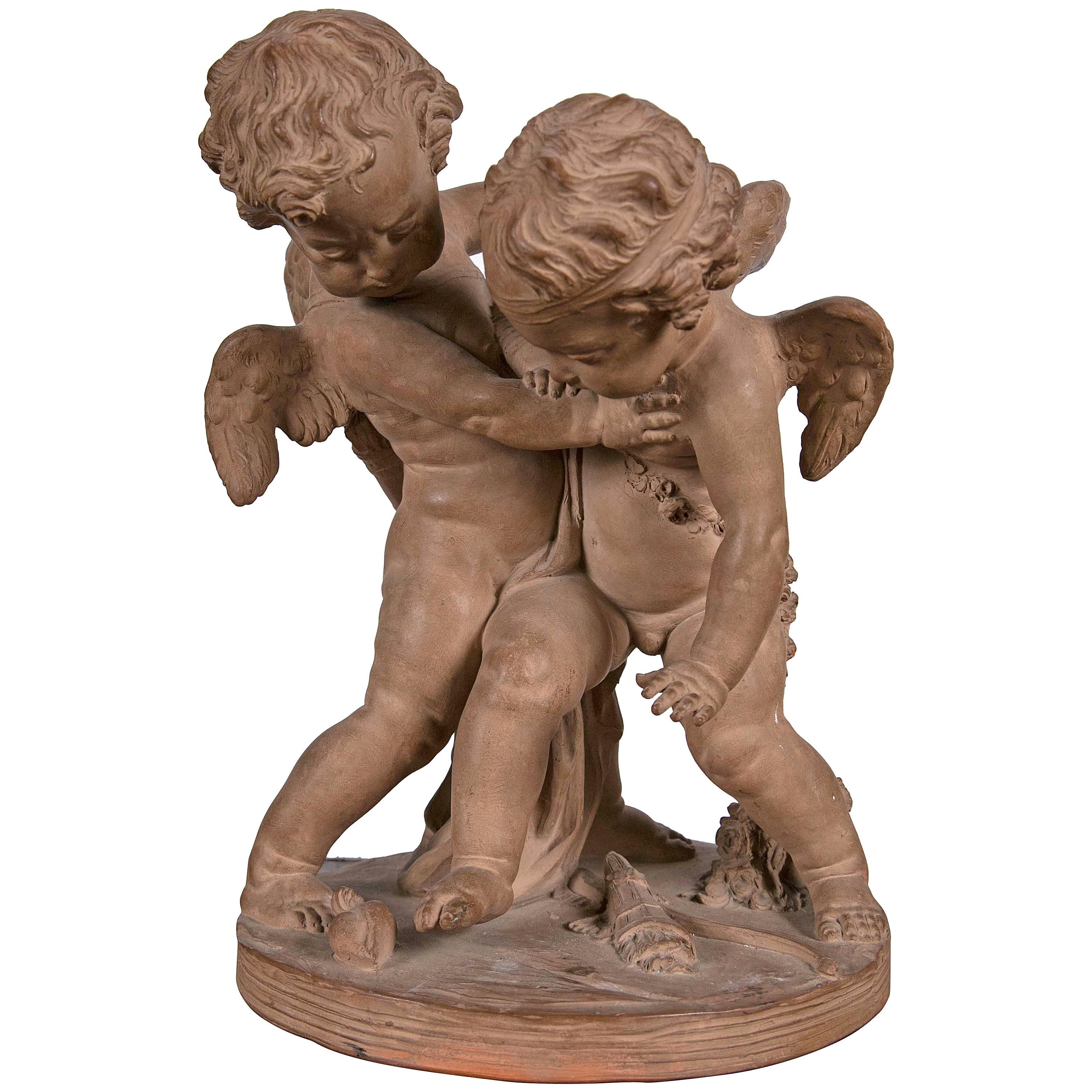 Terracotta Group of Two Cupids For Sale