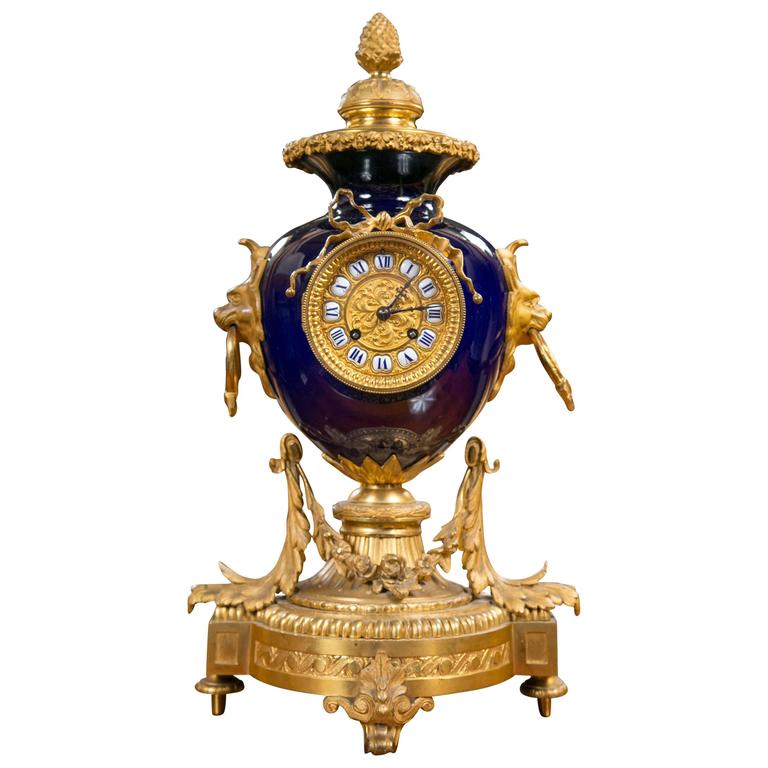 19th Century French GoldPlated Mantel Clock with Carved Wooden Gold