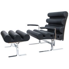 Joe Colombo Roll black Leather and stainless steel Armchair with Footstool, 1962