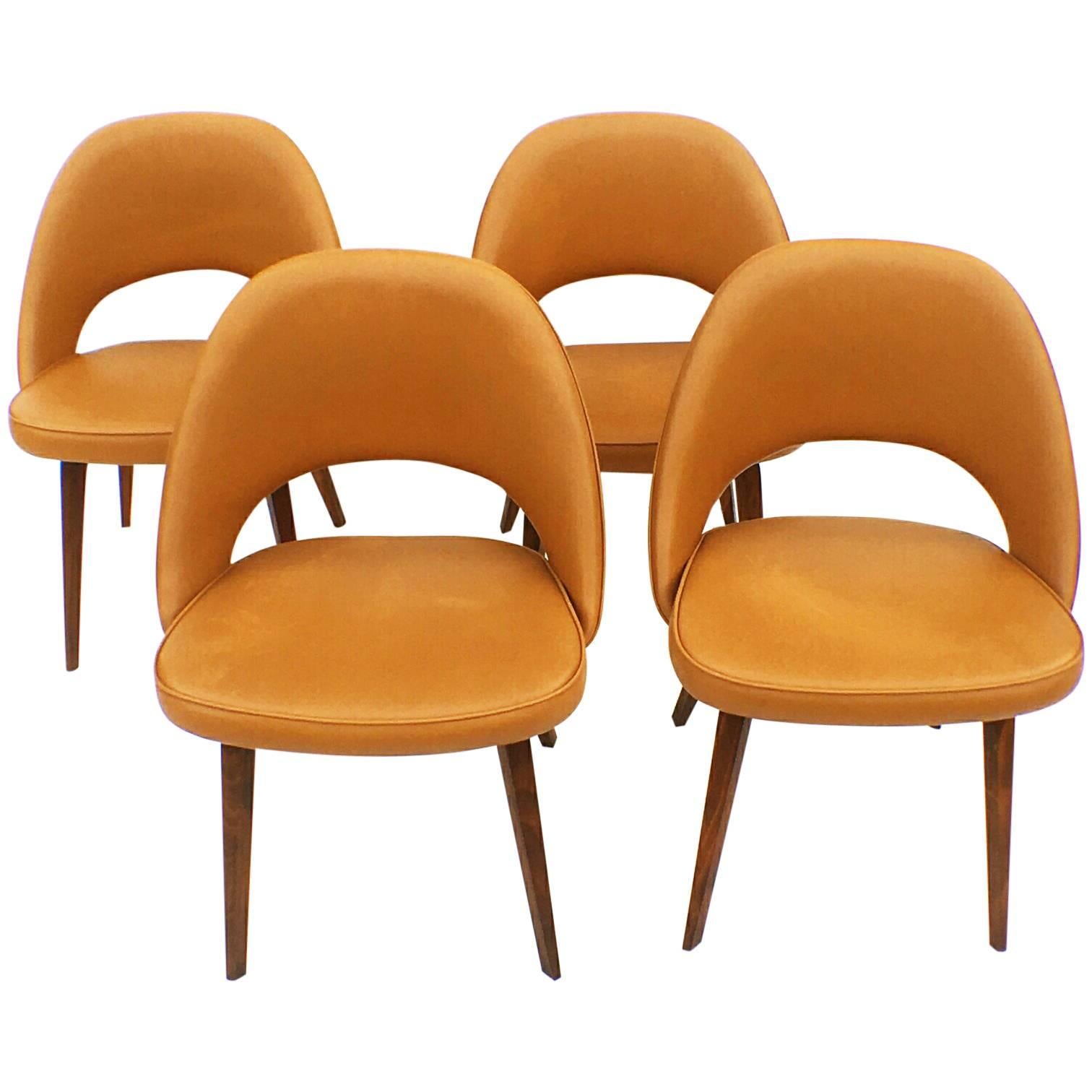 Four Set of Four Early Eero Saarinen Executive Chairs with Wooden Legs