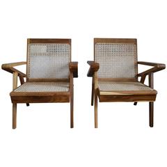 1 of 4 South Asian Teak and Cane Armchairs