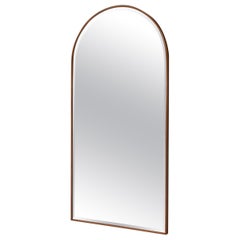 Miroir à cadre voûté