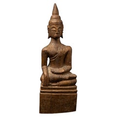 Antique wooden Thai Buddha statue from Thailand