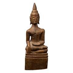 Antique wooden Thai Buddha statue from Thailand