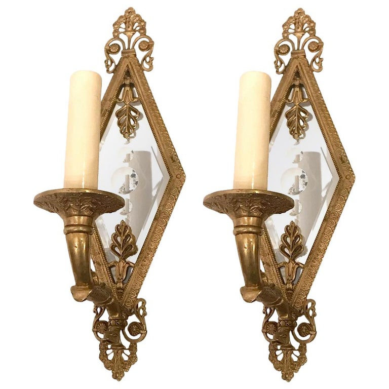 Pair of Mirrored Sconces For Sale