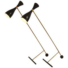 Pair of Black Counterbalance Italian Floor Lamps in the Style of Arredoluce