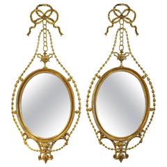 Pair of Carved Wood and Gilt Louis XVI Style Mirrors