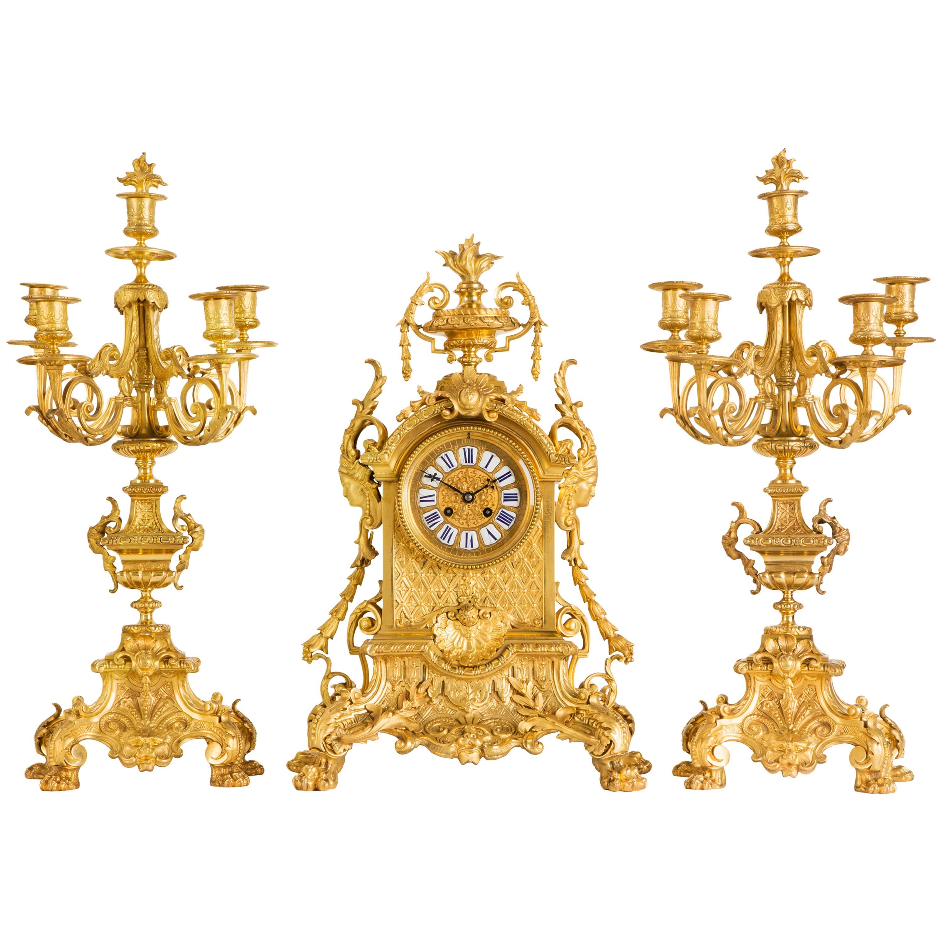 Neo-Gothic antique three piece ormolu clock set