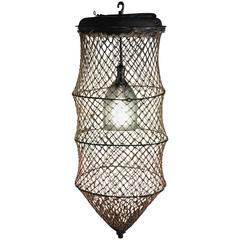 Used Pendant Light from Seltzer Bottle Mounted Inside Fish Trap