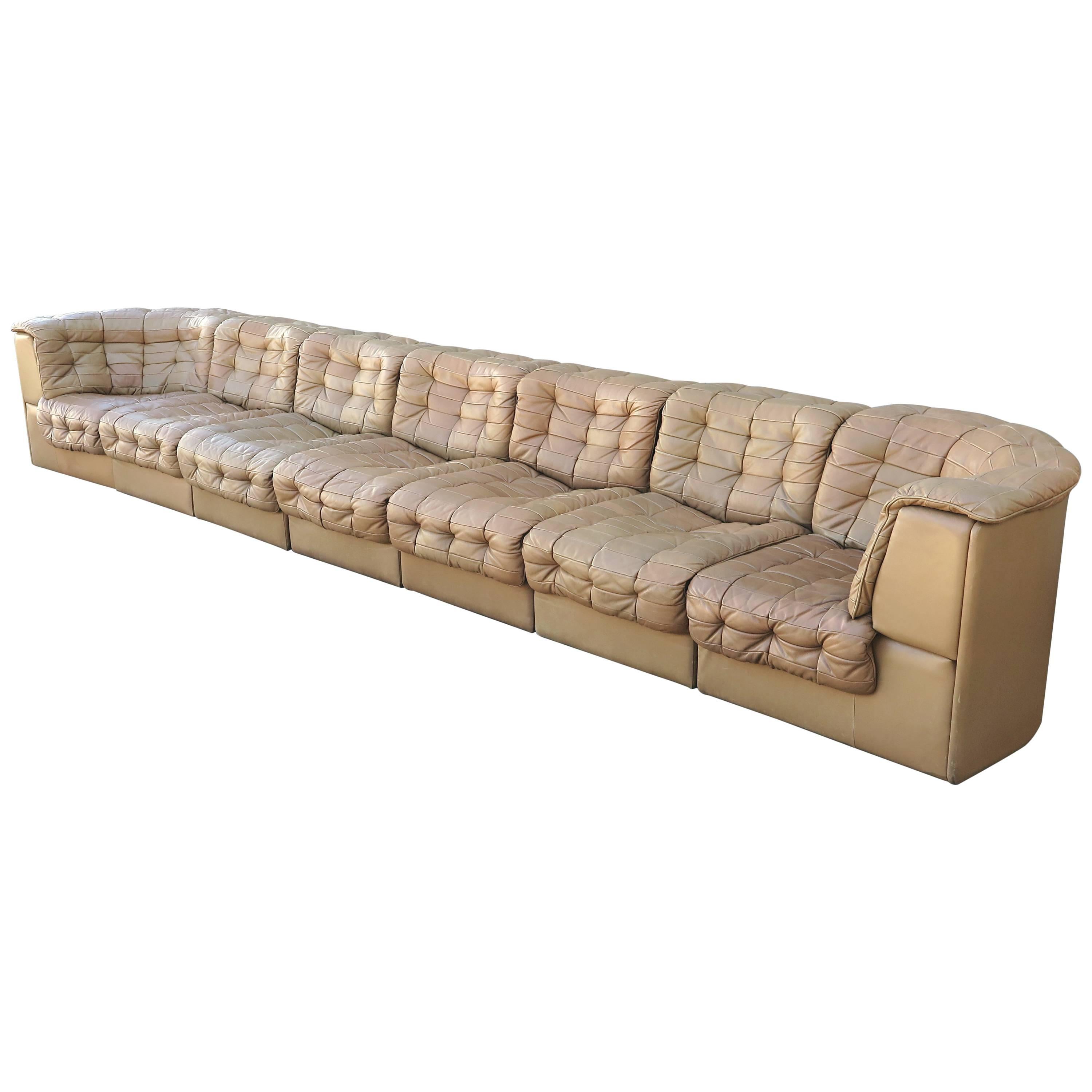Very comfortable sectional De Sede sofa with seven elements and two ottoman, 
soft lightbrown Leather in very good condition, Switzerland circa 1970.