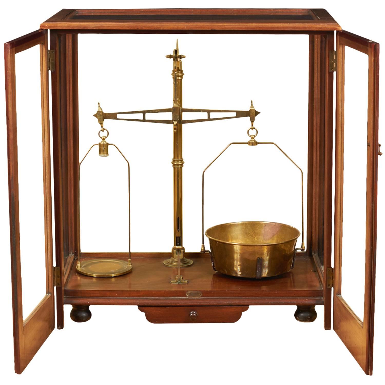 Three Foot Tall Cased Brass and Mahogany Balance by J.H. Heal Co.