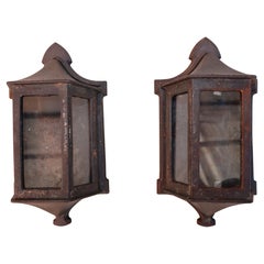 Pair of 1920's cast iron outdoor sconces