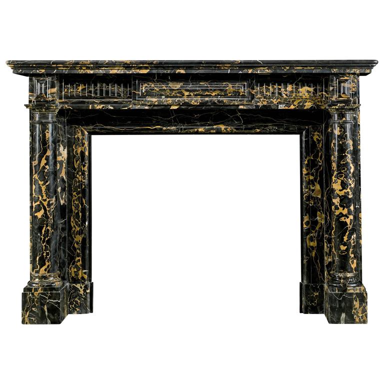 French Regency Antique Fireplace Mantel in Fine Portoro Marble For Sale at 1stdibs For Sale on 1stdibs - A most attractive French Regency columned antique fireplace surround in very fine black and gold veined Italian Portoro Marble. The moulded shelf is set