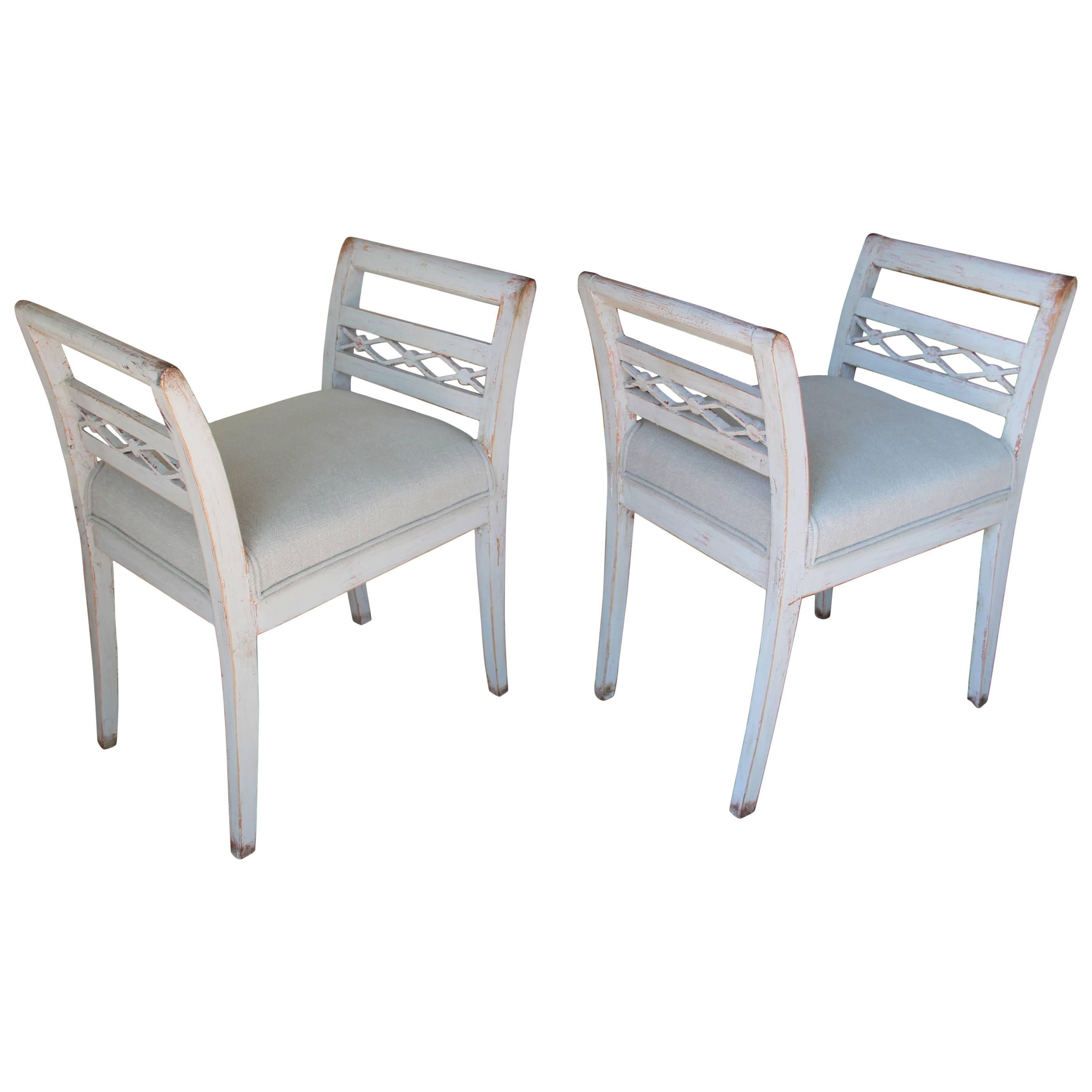 Pair of Swedish stools from the 19th century with slight saber legs, displaying clean neoclassic details on the arms and newly upholstered in de Le Cuona Urban Linen, color stone.

The Gustavian style, named after King Gustav III of Sweden, is a