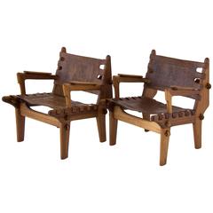 Pair of Angel Pazmino Teak and Leather Lounge Chairs