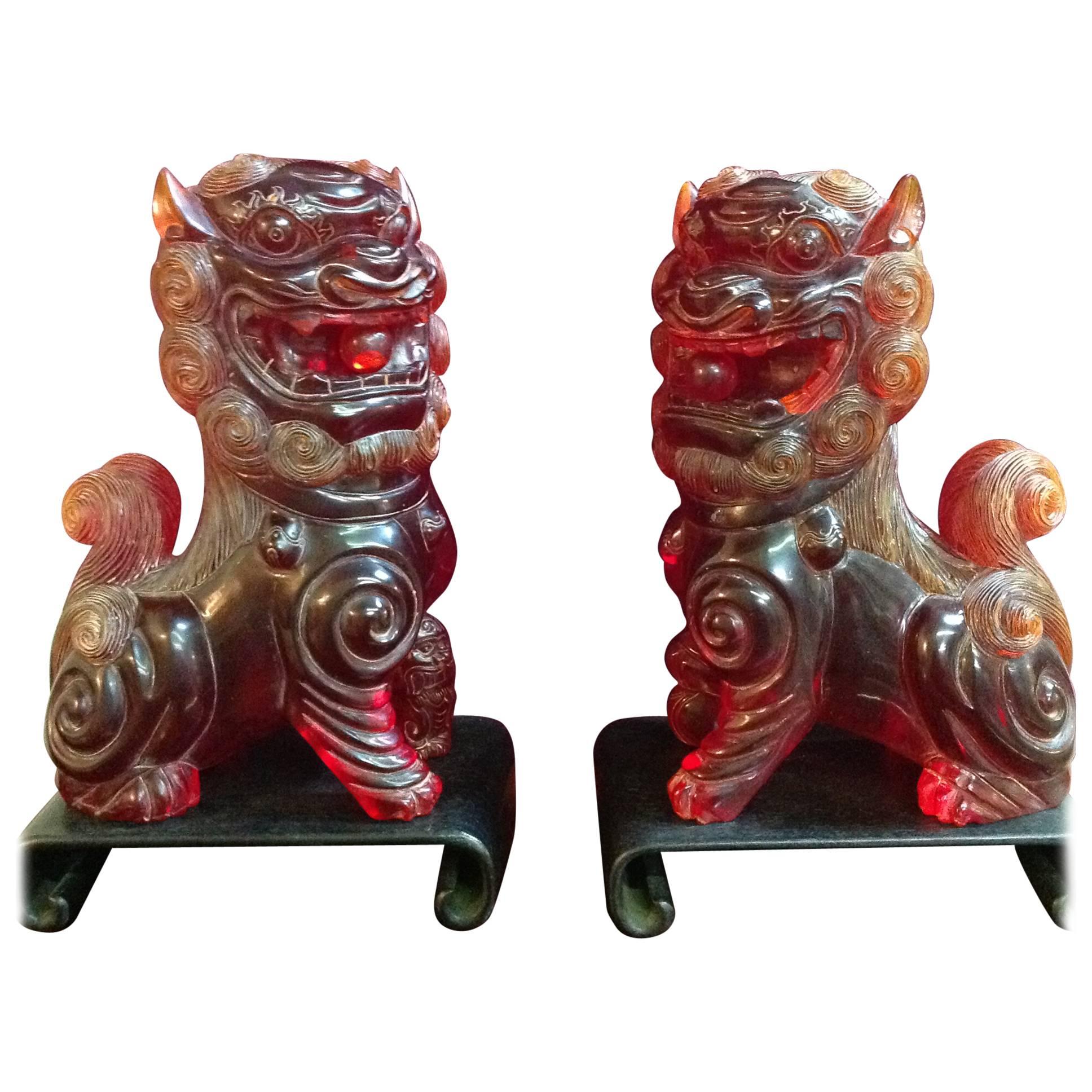 Pair of Mid-20th Century Hand-Carved Chinese Reconstituted Amber Foo Lions For Sale