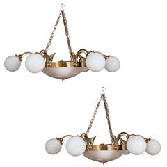 Pair of Grand Brass and Milk Glass Chandeliers