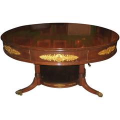 French Empire Mahogany and Gilt Bronze-Mounted Four-Drawer Center Table