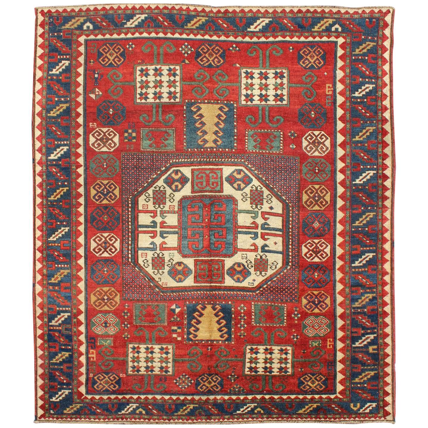 Antique Kazak Karachopf Rug with Octagon Medallion in Red, Blue and Green Tones For Sale