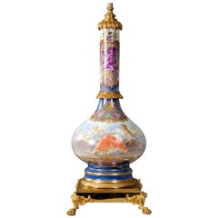 Preciosa lámpara de porcelana estilo Sèvres montada en bronce dorado de finales del siglo XIX
