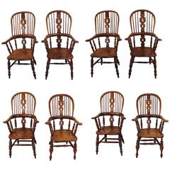 Antique Harlequin Set of Eight Elm and Ash Broad Arm High Back Windsor Chairs