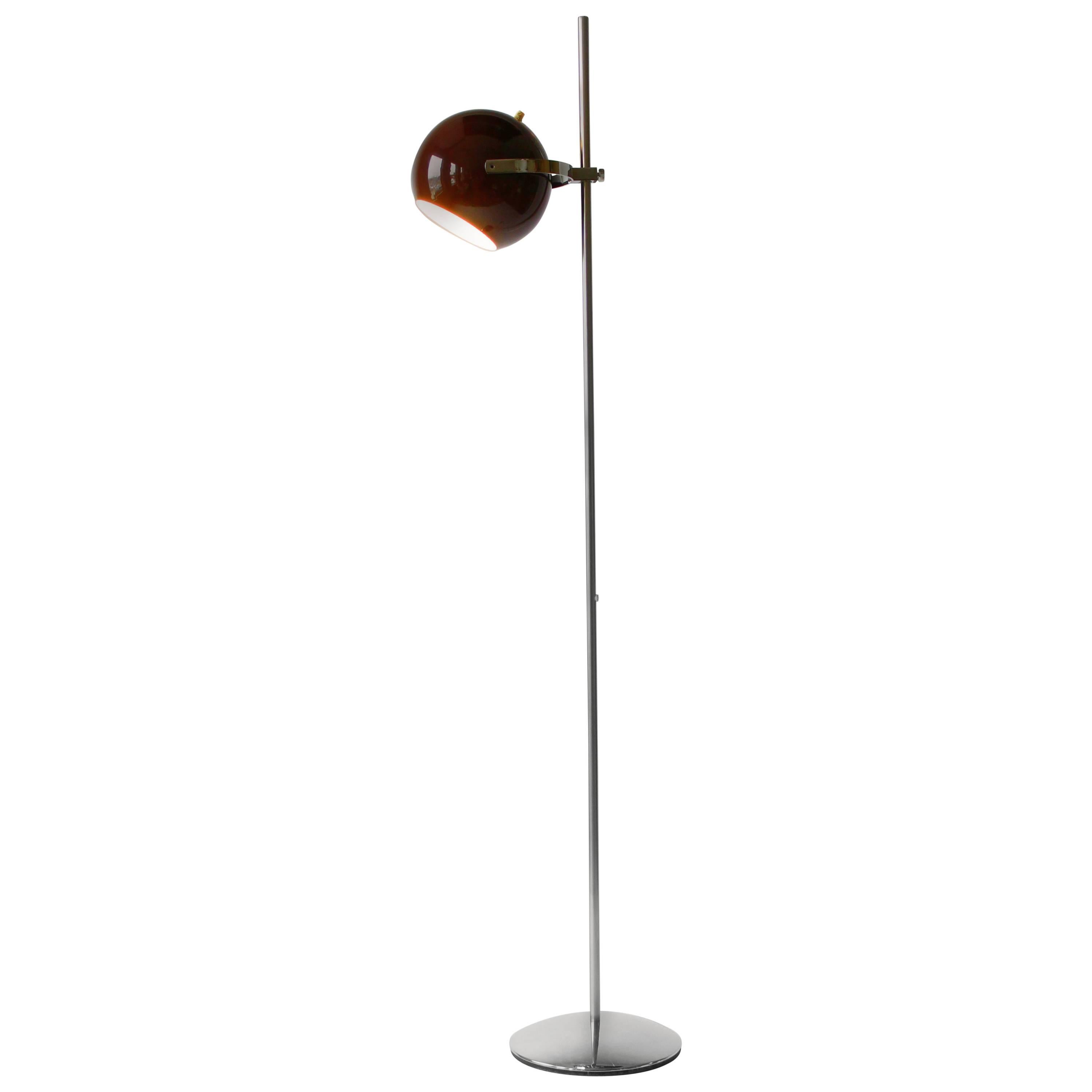 Deep chrome and prime quality hardware. The 9 inches diameter vented eyeball move up and down in chrome stirrup. Does not rotate left to right.

Regular E26 medium size ceramic socket rated at 100 watts.

Rewired.

On/off foot activated chrome