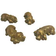Set of Four Bronze Dog Paperweights