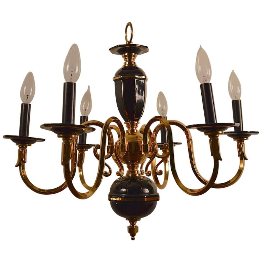 Six-Light Candle Style Black and Brass Chandelier For Sale