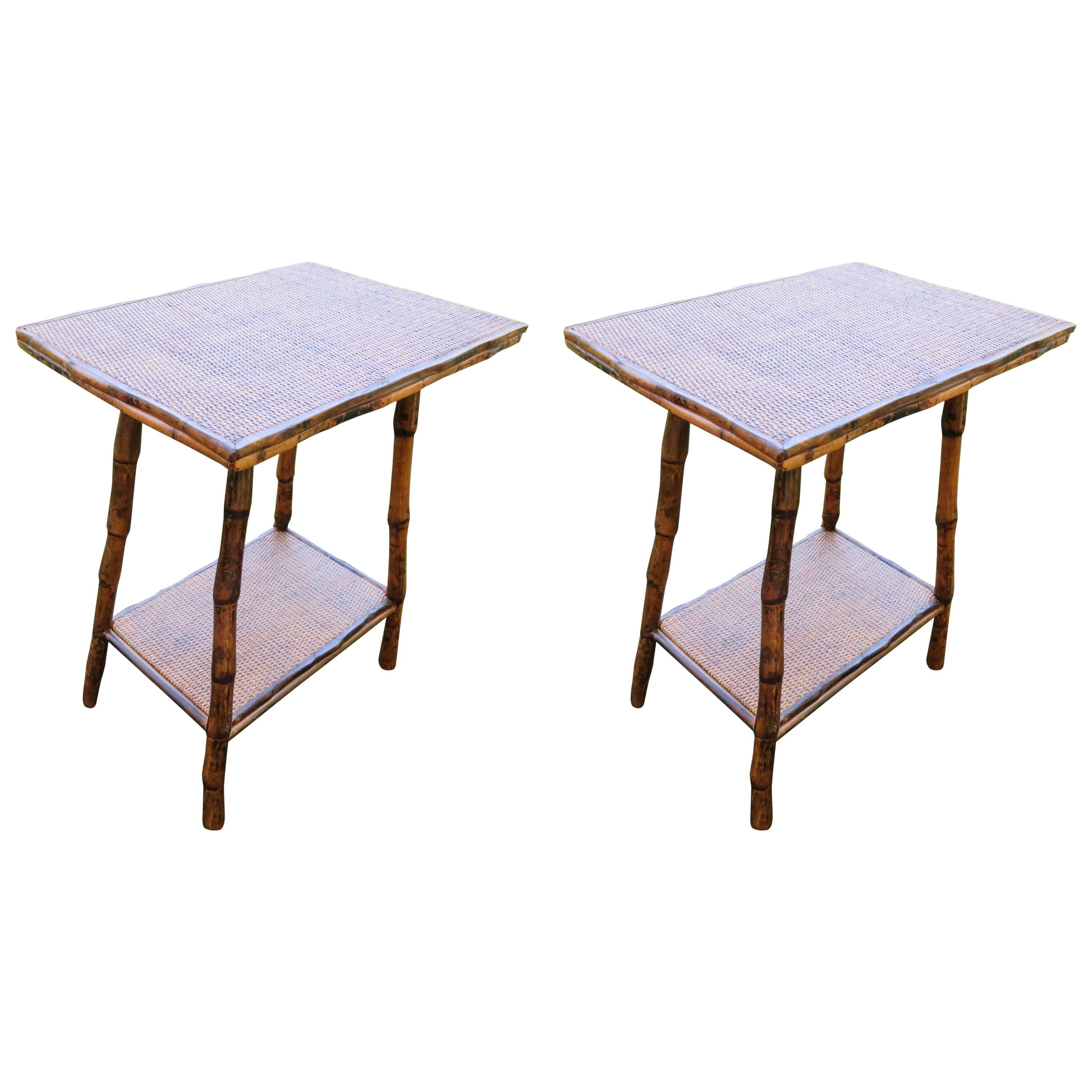 Pair of bamboo and cane rectangular side tables. Two levels with lots of room from lamps and books.