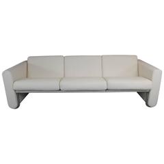 LeCorbusier Style White Sofa With Wrap Around Stainless Steel Frame