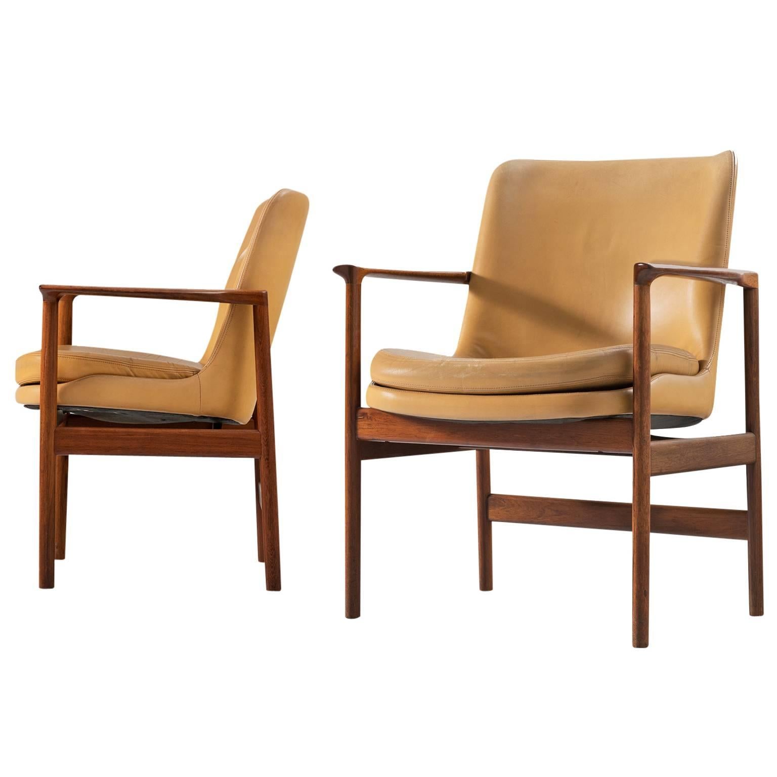 Ib Kofod-Larsen Set of Two Armchairs in Rosewood and Natural Leather 