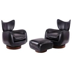 Pair of Vladimir Kagan Leather and Walnut Swivel Lounge Chairs
