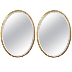 Pair of Oval Crystal and Gold Mirrors