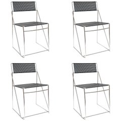 Set of Four Italian Black Metal and Chrome Stacking Chairs